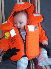 Baby Alexander Marx dons his Life Jacket for the Safety Drill
